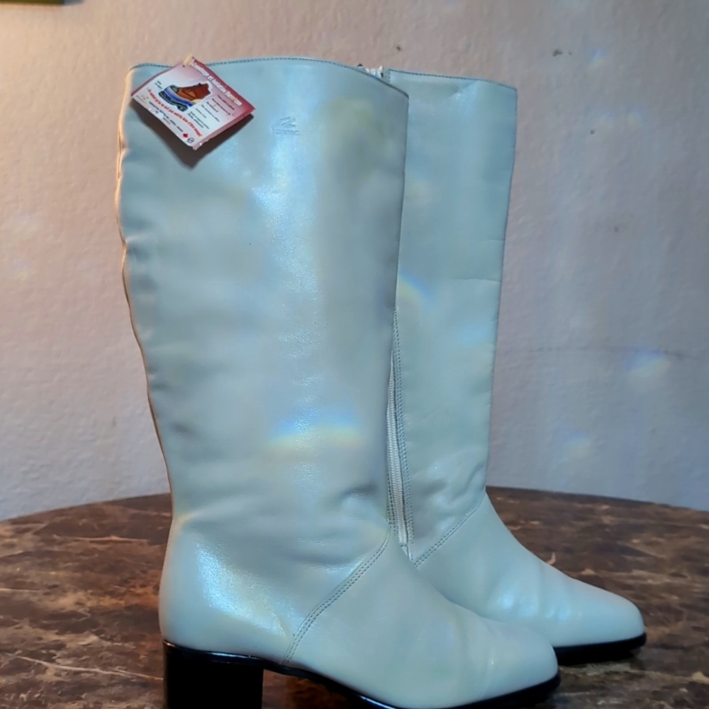 New cream regence boots size 9